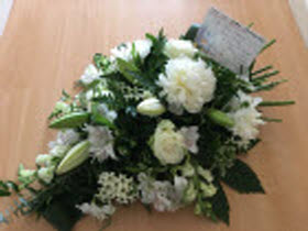 Floral spray in memory of Terry Young